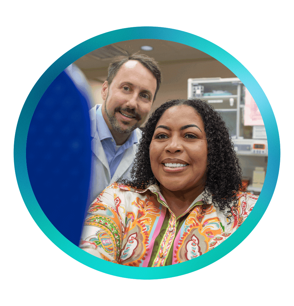 frame of patient smiling brightly with doctor