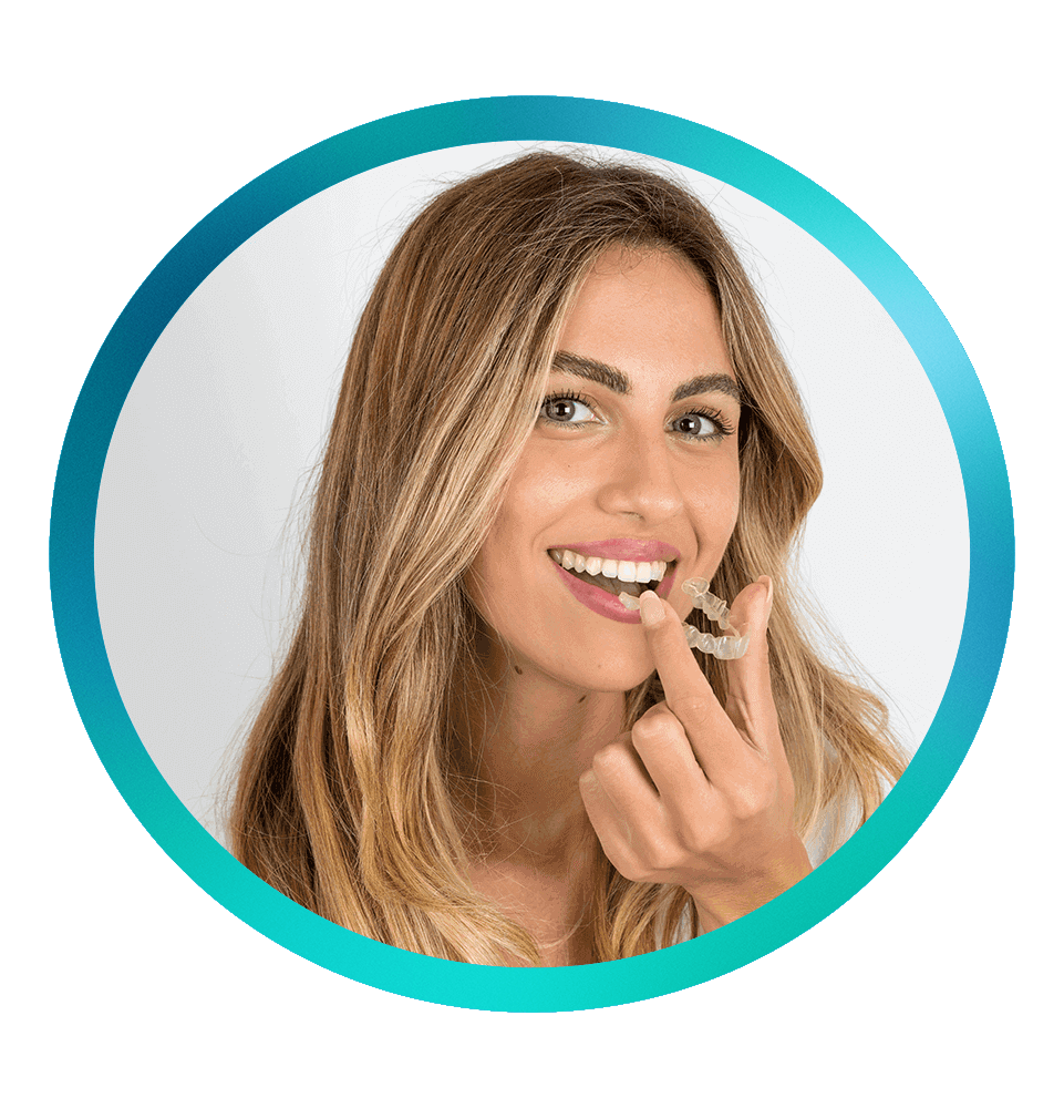 young female putting in their Invisalign