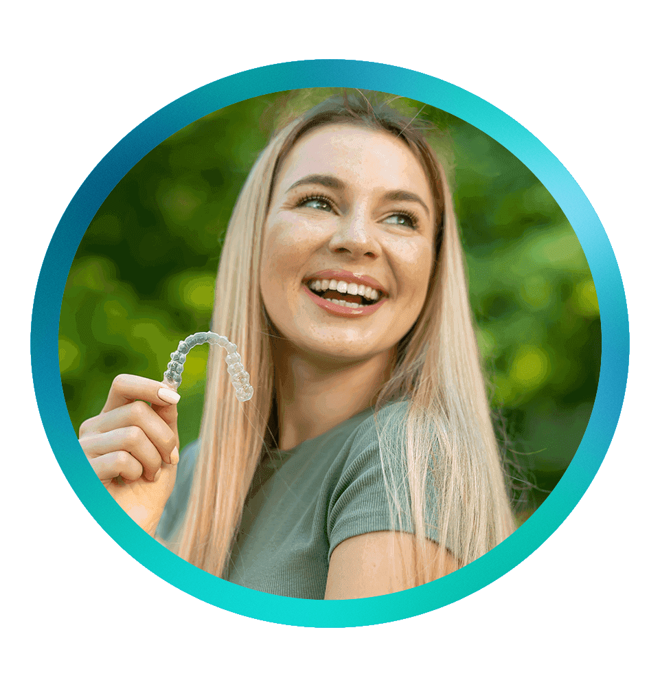 young female smiling brightly while putting in their alingers